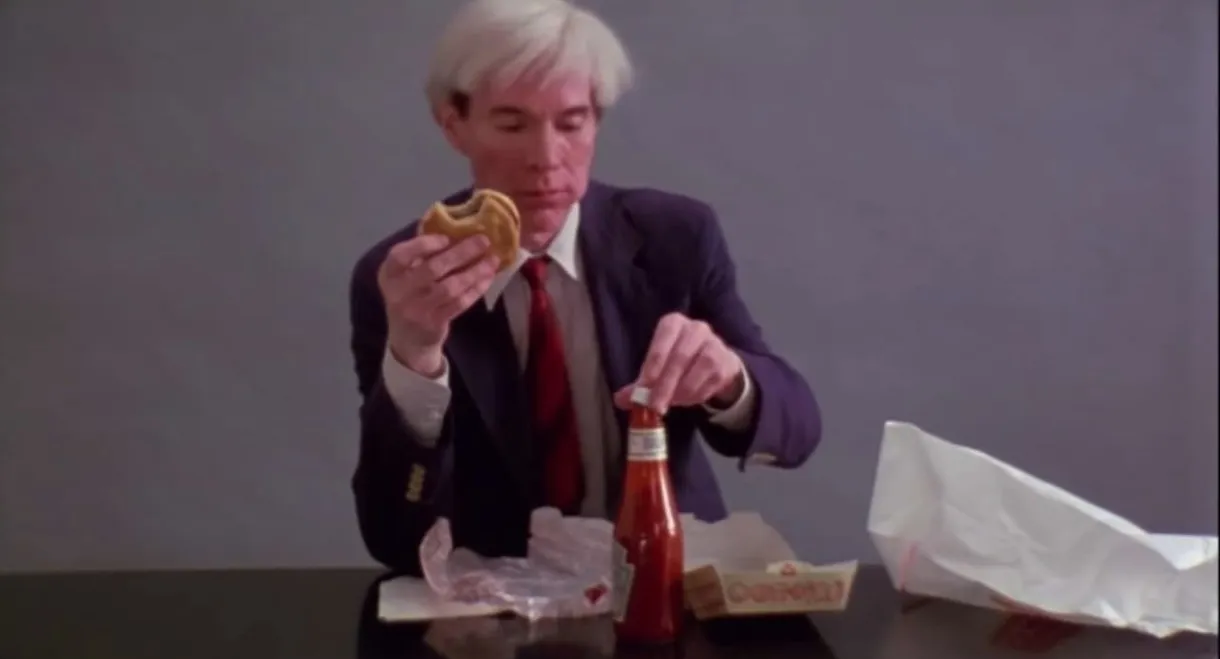 Andy Warhol Eating a Hamburger