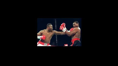 Oliver McCall vs. Larry Holmes