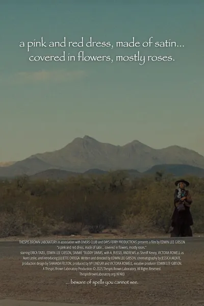 a pink and red dress, made of satin… covered in flowers, mostly roses