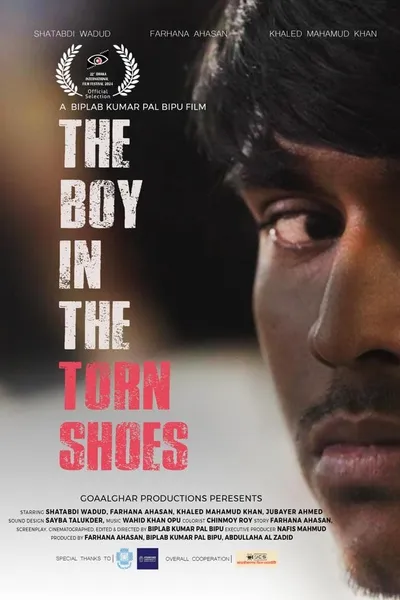 The Boy in The Torn Shoes