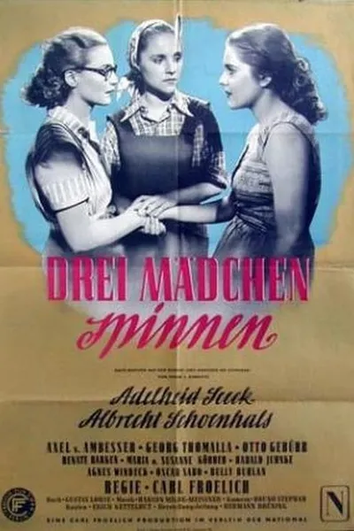 Drei Mädchen spinnen