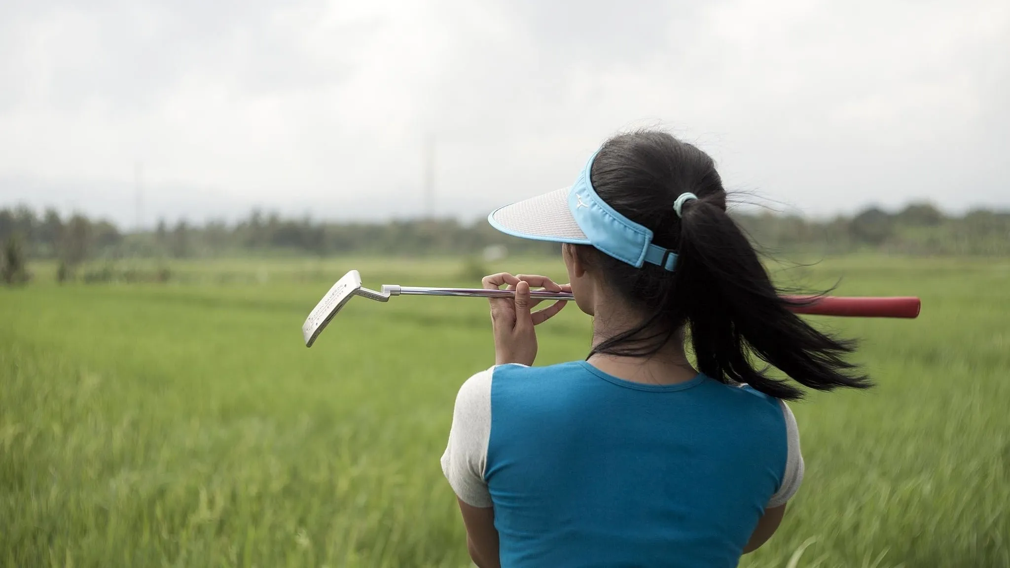 A Lady Caddy Who Never Saw a Hole in One